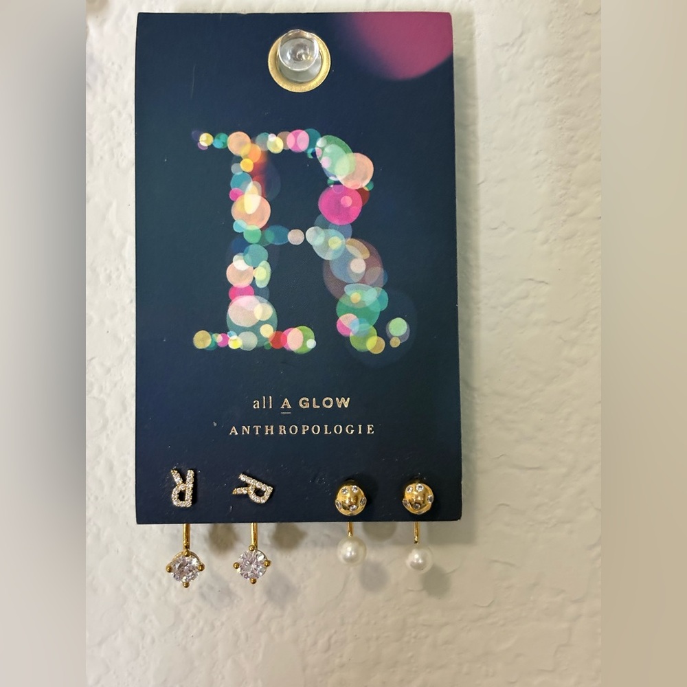 Anthropologie Earrings Set of two pairs. One monogram “R” and stud. New on card